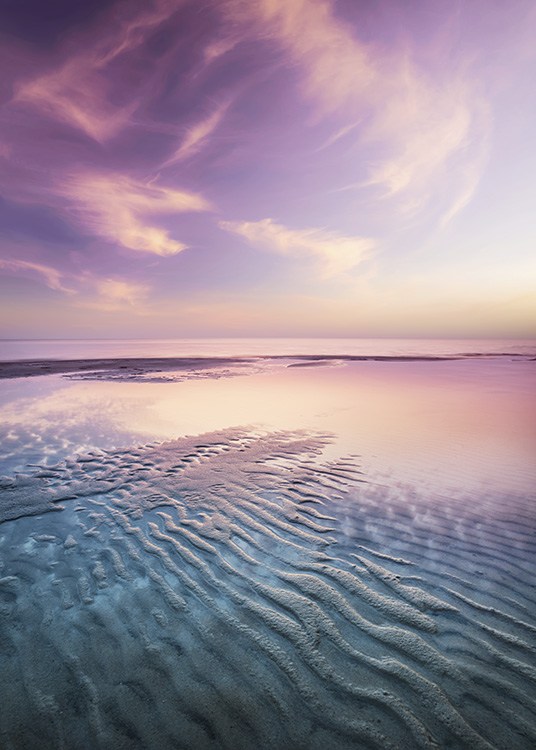 – Superbe photo d'un coucher de soleil orangé et rosé à marée basse sur bord de mer