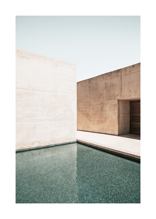  – Photographie de bâtiments en béton avec une grande piscine au premier plan