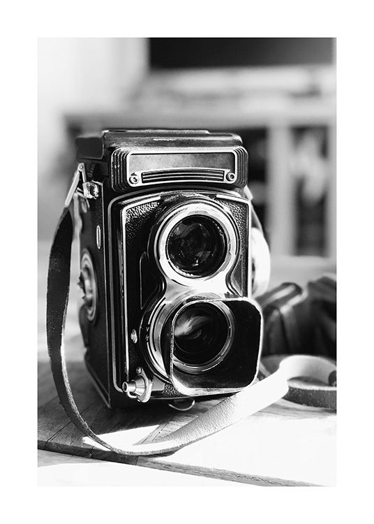  - Photographie en noir et blanc d'un vieil appareil photo rétro