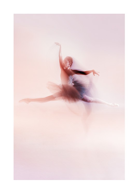  - Photographie d'une danseuse étoile qui saute en l'air, elle porte une jupe en tulle