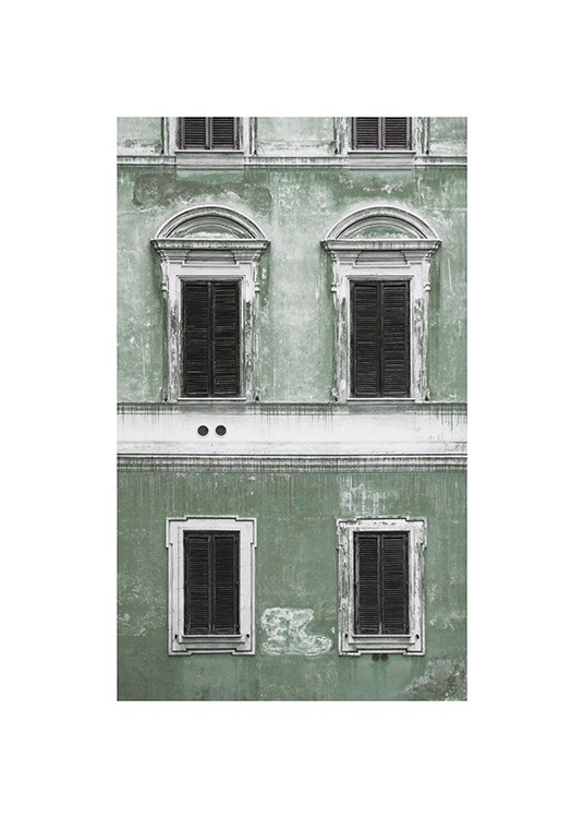  – Photographie d’une façade verte avec une touche vintage et des fenêtres noires et blanches
