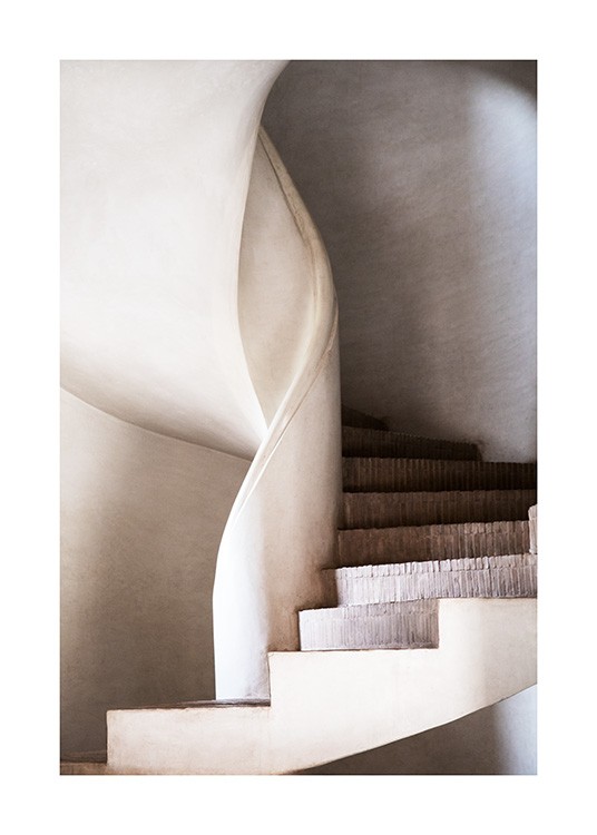  - Photographie d'un escalier en siprale avec des marches en brique