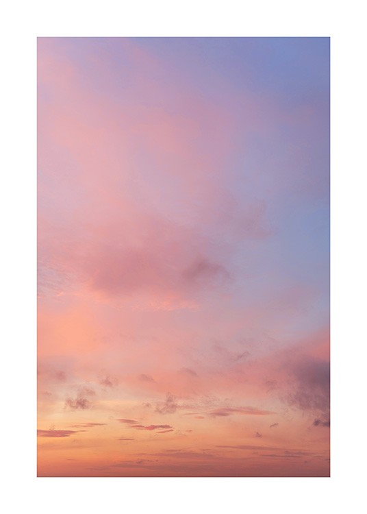  – Photographie d’un coucher de soleil avec des nuages roses dans un ciel mauve